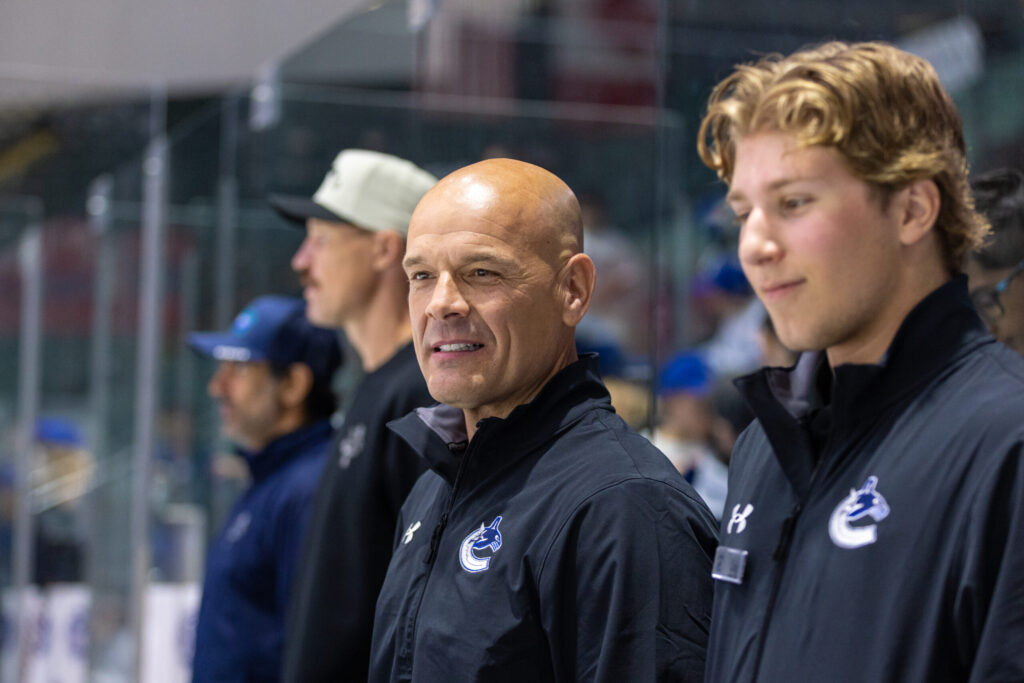 Coaching staff at rink side